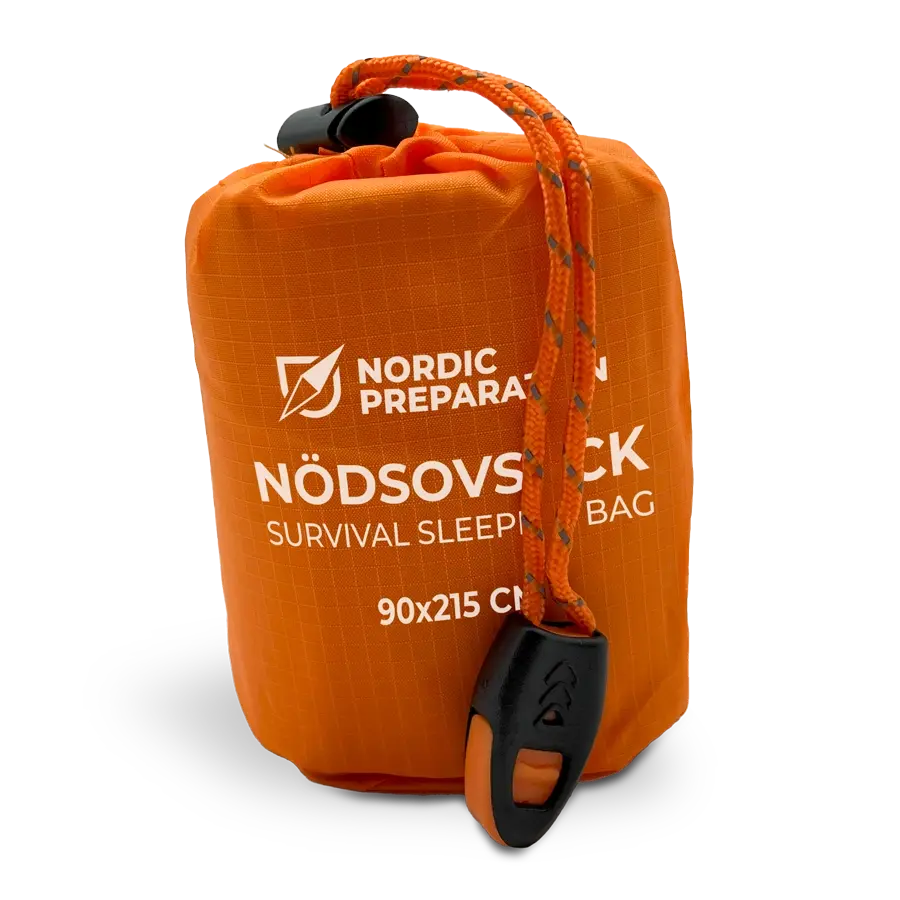 Nödsovsäck med nödvisselpipa